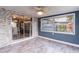 Bright sunroom with large windows and sliding door at 4545 Annette St, New Port Richey, FL 34652