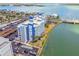 Coastal condo building showcasing water views, parking, and boat access at 500 Treasure Island Cswy # 607, Treasure Island, FL 33706