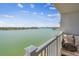 Balcony offers stunning views of the water and cityscape under a beautiful cloudy sky at 500 Treasure Island Cswy # 607, Treasure Island, FL 33706
