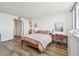 Cozy bedroom features hardwood floors, a workspace and closet space at 500 Treasure Island Cswy # 607, Treasure Island, FL 33706
