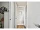 Hallway featuring marble and hardwood floors and multiple large storage closets at 500 Treasure Island Cswy # 607, Treasure Island, FL 33706