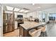 Updated kitchen with stainless steel appliances, granite countertops, and a functional island with bar seating at 500 Treasure Island Cswy # 607, Treasure Island, FL 33706
