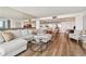 Open-concept living area seamlessly integrates living, dining, and kitchen spaces at 500 Treasure Island Cswy # 607, Treasure Island, FL 33706