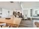 Open-concept living area with adjacent kitchen and dining, and views of the water at 500 Treasure Island Cswy # 607, Treasure Island, FL 33706