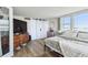 This bedroom boasts hard floors, barn doors and lots of natural light at 500 Treasure Island Cswy # 607, Treasure Island, FL 33706