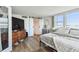 This bedroom boasts hard floors, barn doors and lots of natural light at 500 Treasure Island Cswy # 607, Treasure Island, FL 33706
