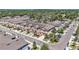 An aerial shot shows the layout of the houses with attached garages and well maintained landscaping at 5005 Blue Latan Ln, Tampa, FL 33610