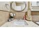Bathroom vanity features neutral colored walls and an ornate mirror at 504 E Lee St, Plant City, FL 33563