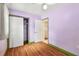 Bright bedroom featuring a closet, a window, and laminate flooring at 504 E Lee St, Plant City, FL 33563