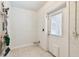 Functional laundry room with white walls and tile flooring at 504 E Lee St, Plant City, FL 33563