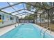 Covered pool area offers a private oasis for swimming and relaxation at 504 E Lee St, Plant City, FL 33563