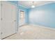 Bright room features tile flooring and a back door at 504 E Lee St, Plant City, FL 33563