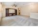 Open living space with carpet and ceiling fan at 5205 Lansdowne Way, Palmetto, FL 34221