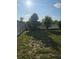 Spacious backyard with healthy green grass and well maintained fence line at 5391 Baldock Ave, Spring Hill, FL 34608