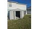 Backyard view of open metal storage shed at 5391 Baldock Ave, Spring Hill, FL 34608