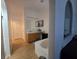 Well-lit bathroom with a vanity, a large mirror, and a soaking tub for a relaxing experience at 5391 Baldock Ave, Spring Hill, FL 34608