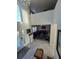 Grand foyer with high ceilings, tile flooring, chandelier, and an ornate glass door at 5391 Baldock Ave, Spring Hill, FL 34608