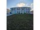 Charming two-story home with solar panels and a well-maintained lawn at 5391 Baldock Ave, Spring Hill, FL 34608