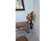 Hallway featuring a vase, ornamental bench, and tile flooring at 5391 Baldock Ave, Spring Hill, FL 34608