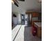 Bright kitchen with stainless steel appliances, light wood cabinets, and a center island at 5391 Baldock Ave, Spring Hill, FL 34608