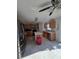 Bright kitchen with stainless steel appliances, light wood cabinets, and a center island at 5391 Baldock Ave, Spring Hill, FL 34608