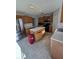Spacious kitchen with stainless steel refrigerator, island and light wood cabinets at 5391 Baldock Ave, Spring Hill, FL 34608