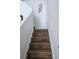 Staircase with wooden steps at 5391 Baldock Ave, Spring Hill, FL 34608