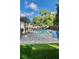 Spacious backyard with a sparkling pool and ample seating area, perfect for entertaining at 5645 97Th N Way, St Petersburg, FL 33708