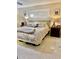 Bedroom featuring shutters on the window and two side tables with lamps at 5645 97Th N Way, St Petersburg, FL 33708