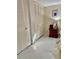Cozy bedroom featuring ample closet space and a vintage wood nightstand at 5645 97Th N Way, St Petersburg, FL 33708