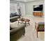 Inviting living room with plush seating, modern furnishings, and neutral color palette at 5645 97Th N Way, St Petersburg, FL 33708
