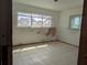 The bedroom offers tile floors and a water view from the window at 5930 Bahama N Way, St Pete Beach, FL 33706