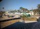 A construction site with heavy machinery and building materials, indicating property development and land improvement at 5930 Bahama N Way, St Pete Beach, FL 33706