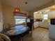 Dining room with chandelier and view of the kitchen area at 5930 Bahama N Way, St Pete Beach, FL 33706