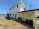 Exterior view of the property with stairs to an upper deck and access to the waterfront at 5930 Bahama N Way, St Pete Beach, FL 33706