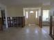 Living room with tiled floors and front door view at 5930 Bahama N Way, St Pete Beach, FL 33706