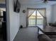 Living room with water view and sliding glass door to the outside deck at 5930 Bahama N Way, St Pete Beach, FL 33706