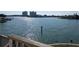 Sparkling canal with boats docked and views of high-rise condos in the distance at 5930 Bahama N Way, St Pete Beach, FL 33706