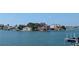 Beautiful waterfront homes with docks, surrounded by tranquil blue water and clear sky at 5930 Bahama N Way, St Pete Beach, FL 33706