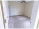 Cozy bedroom with neutral carpet and a ceiling fan at 621 Washita Stone Dr, Ruskin, FL 33570