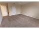 Neutral carpeted bedroom with double door closet at 621 Washita Stone Dr, Ruskin, FL 33570