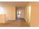 Upstairs hallway area with carpet and access to multiple rooms; natural light and neutral paint at 621 Washita Stone Dr, Ruskin, FL 33570