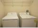 Functional laundry area with washer and dryer, providing convenience and efficiency at 621 Washita Stone Dr, Ruskin, FL 33570