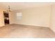 A spacious living room with neutral carpet and plenty of light at 621 Washita Stone Dr, Ruskin, FL 33570