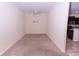 A cozy living room with neutral carpet and ceiling fan at 621 Washita Stone Dr, Ruskin, FL 33570
