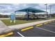 Community playground features slides, swings, and shaded seating for residents to enjoy at 621 Washita Stone Dr, Ruskin, FL 33570