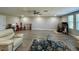 Spacious living area featuring luxury vinyl plank flooring at 6244 English Hollow Rd, Tampa, FL 33647