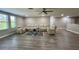 Bright living room featuring modern seating and luxury vinyl flooring at 6244 English Hollow Rd, Tampa, FL 33647