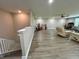 Spacious living area featuring luxury vinyl plank flooring at 6244 English Hollow Rd, Tampa, FL 33647