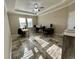 Spacious home office with plenty of desk space and natural lighting at 6244 English Hollow Rd, Tampa, FL 33647